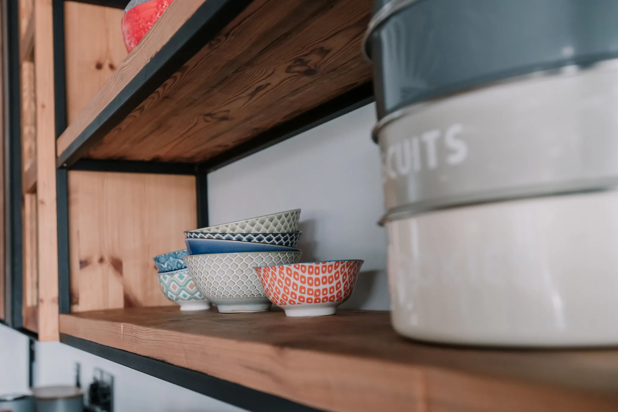 Shelves with porcelain bowls.